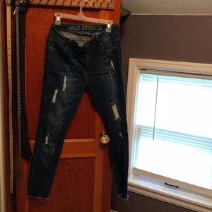 Ripped jeans, dark blue. “New”